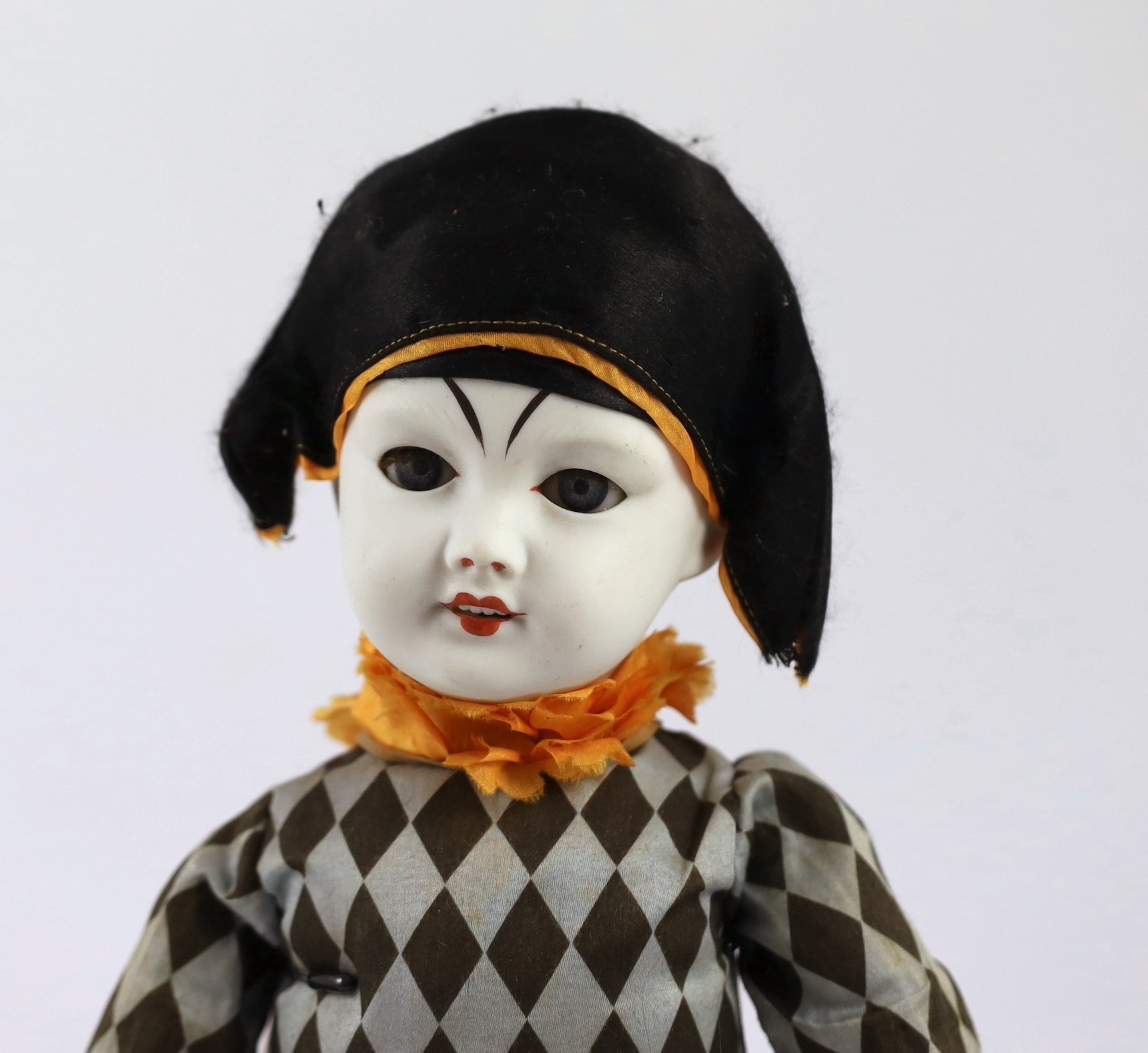 An SFBJ Harlequin clown, French, circa 1925, 16.5in.